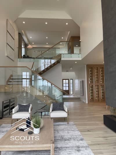 A fully finished villa for sale, immediate handover with an amazing view of the landscape and lagoons in a fully serviced compound, directly on the Su