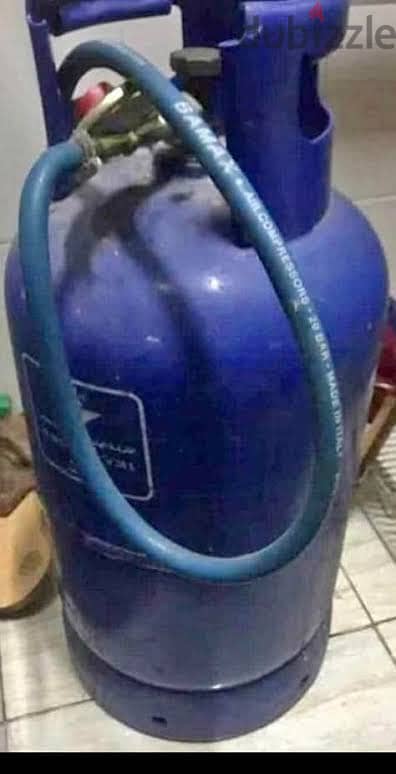 أنبوبة بالمنظم والخرطوم