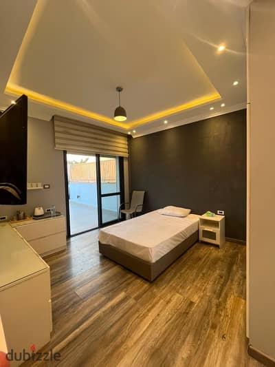 Furnished hotel rooftop apartment for rent at an incredible price. 25 sq m, lowest price per meter. Elshiekh zayed, Beverly Hills Compound. westown