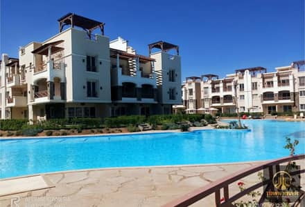 Chalet for sale with a stunning view near the windmills at Blue Blue Village, Ain Sokhna; finished and tastefully furnished. The village offers full .
