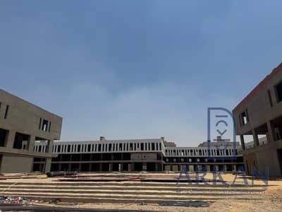 76m clinic immediate receipt - October Gardens - Spanish Neighborhood - in front of Beta Compound and the beginning of the largest mega mall in the area with a 30% down payment and the remaining installments over 4 years