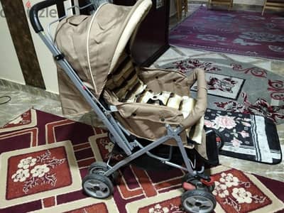 عربة أطفال بسعر ١٥٠٠