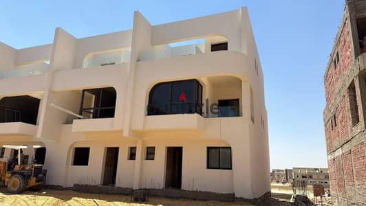 Townhouse villa for sale in the heart of Taj City, directly on the Shinzo Abe Axis and just minutes from Cairo International Airport, with an 8-year i