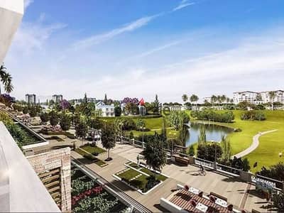 شقة ب جاردن على الclub house بالصيانة والنادى في ماونتن فيو اي سيتي