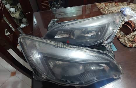 طقم فوانيس اوبل استرا 2016 امامي ديبو