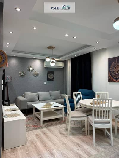 Furnished studio apartment for rent in Madinaty, 58 sq m, in B6. High-end finishes, direct sea view, wide garden view, very close to amenities, minute