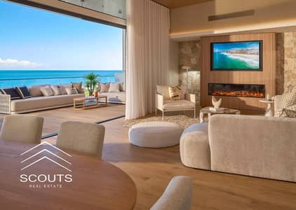Fully finished beachfront apartment with air conditioning private beach and a view of Crystal Lagoons for sale in El Alamein Towers North Coast