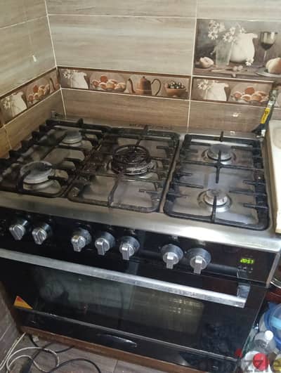 بوتاجاز يونيون إير I Cook  خمس شعلات و فرن إشعال ذاتي بحالة جيدة