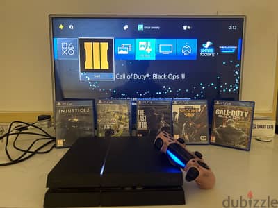 Ps4 original with 5 games and an original controller