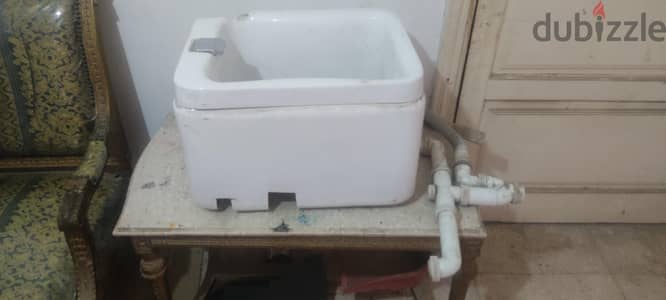 حوض بديكير لغسيل ونقع القدمين. و جهاز سخان شمع