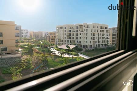Furnished two-bedroom apartment for monthly rent in O West compound, 6th of October City, near Arkan Plaza