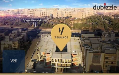 Shop for sale in New Cairo (Tagamoa), facing the American University; ground floor, 70 sqm + 111 sqm outdoor area, next to Point 90.