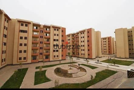 90 m apartment for sale, Al Obour City, Al Karama neighborhood, elevated ground floor, safe iron.
