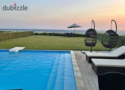 chalet+garden for sale in Marina 8, North Coast. Panoramic view of the sea and lagoon. Direct access. Distinguished chalet, fully finished
