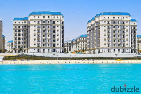 Two-bedroom unit for sale with a stunning, direct sea view. Fully finished and ready for immediate handover. Located in North Costa (Latin District),