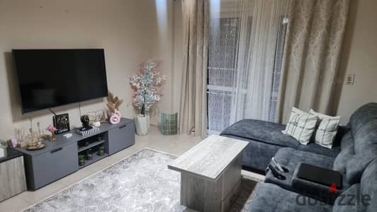 For sale in Madinaty, a ground floor apartment with a private garden, Talaat Moustafa, not for allocation, in B6 at a bargain price