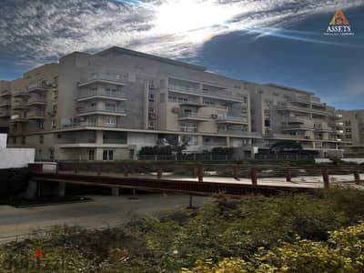 Apartment with private garden 94 sqm Prime Location for Sale in Mountain View iCity New Cairo