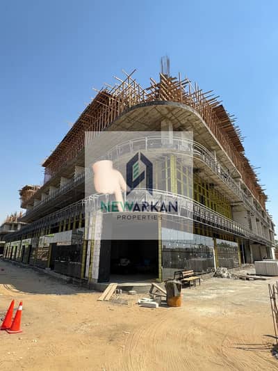 معرض سيارات  264م لوكيشن مميز جدا وجهه محور 26 يوليو بمقدم 10% فقط استلام اقل من8 شهور