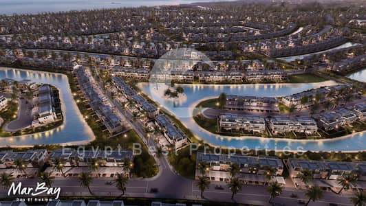 شاليه للبيع في مارباي راس الحكمه متشطب بالتكييفات والمطبخ  من البيت على اللاجون وبحري 100% في الساحل الشمالي