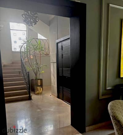 At half price villa in a prime location in the compound wall in wall with an open air mall Madinaty