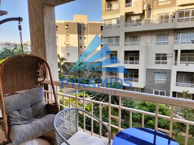 A great deal on a furnished apartment for rent, 116 square meters, in Talaat Mostafa, with a garden view and high-end finishes (B10).
