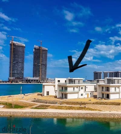 For sale chalet ground floor with a garden fully finished direct sea view ready to move located in the Mazarine compound in New Alamein