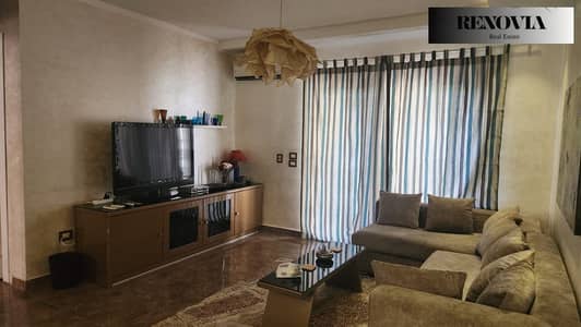 A special furnished apartment for rent in Madinaty in B7 with a private garden