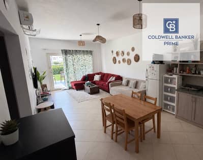 108m² chalet with private garden, finished with air conditioning, prime location overlooking a swimming pool and landscaped garden in Amwaj -2 bedroom