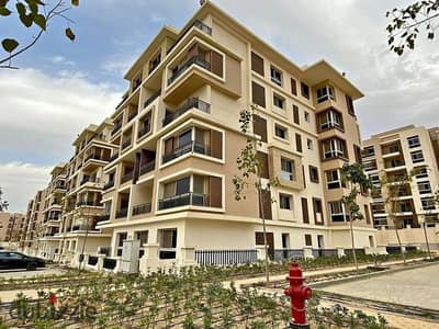 Two-bedroom apartment for sale with a down payment of 300,000 in Taj City Compound, First Settlement, New Cairo.