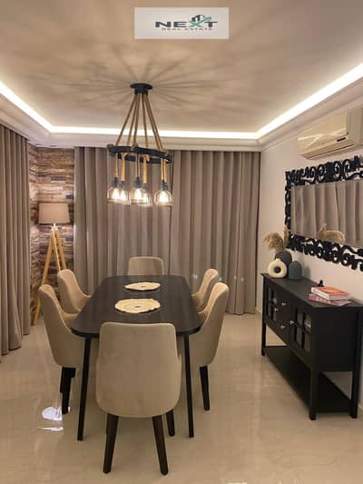 Furnished apartment for rent in Madinaty, B1, 211 sq m, high-end finishes, modern furnishings, wide garden view. Price: 60,000 EGP. Close to services,