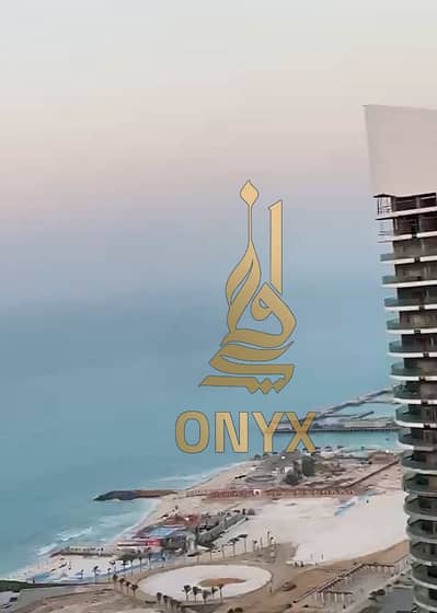 شقة 90م ريسيل بيع بالفرش بدور فوق ال30 في الابراج بفيو جانبي بحر ومباشر لاجون بأقل سعر في ابراج النورث ايدج بالعلمين - North Edge Tower in Alamein