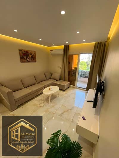 Furnished apartment for rent in Al-Rehab, Phase Five, new, first occupancy, 2 bedrooms, garden view, special finishing, private elevator, close to the mosque. 50 thousand.