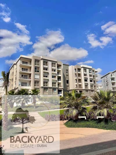 apartment in Hyde Park Fifth settlment, Golden Square, near Mivida, with 5% down payment and interest-free installments up to 10 years.