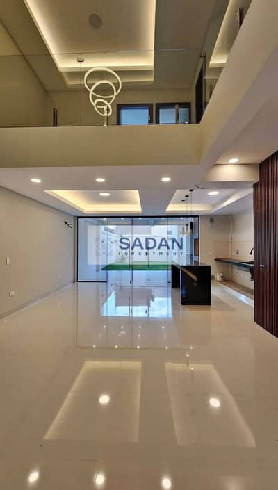 Last duplex for sale with a 50% discount, opposite Cairo Airport, extension of Al Thawra Street, VIP roof view and prime location in Taj City, New Cai