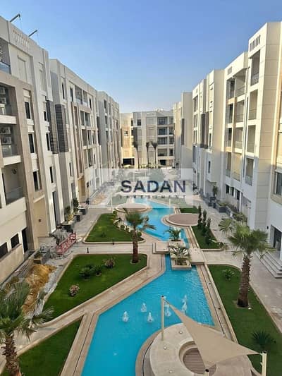 Fully finished apartment for sale in Al-Gar Compound, with installments over 7 years, in a prime location on the Suez Road - opposite Madinaty Gate 4