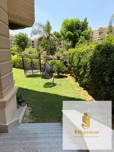 Ground floor apartment with garden, furnished to hotel standards, ultra-super-lux finishing, first occupancy in Ramblas Compound, Fifth Settlement