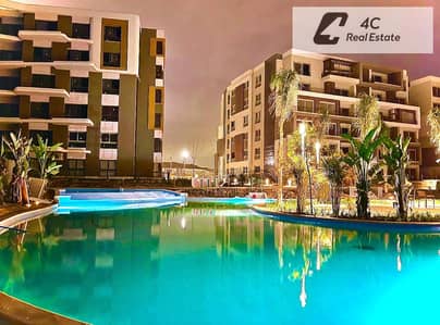 Palm Hills New Cairo Cleo ground apartment for sale 172 sqm + 95m garden lagoon view corner north facing 3 bedrooms fully finished installment