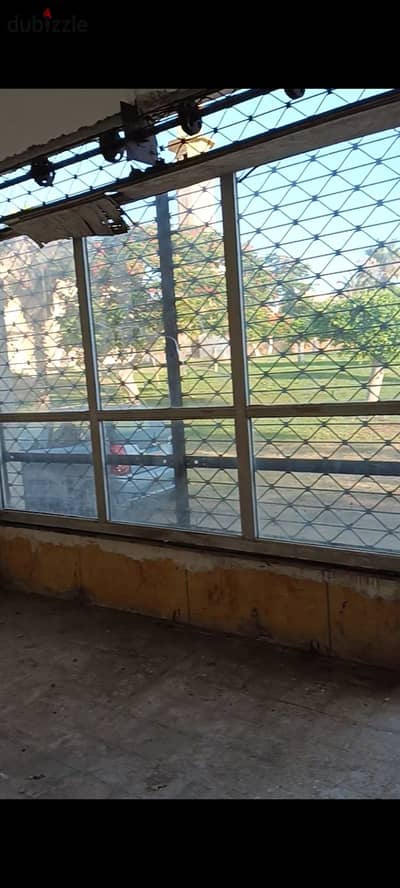 For sale shop in the distinguished villas area, ground floor, in front of a school