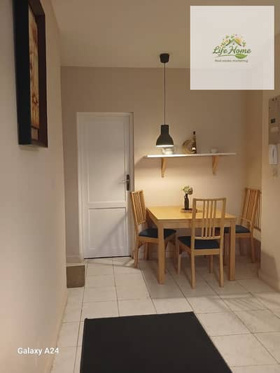 Furnished apartment for rent in Al-Rehab, two bedrooms near the old market