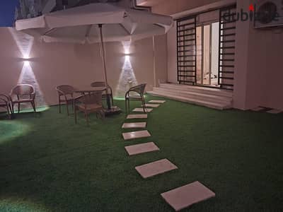Hotel apartment for sale in Zayed Heights Compound, ground floor with private garden, ultra-luxurious finishing