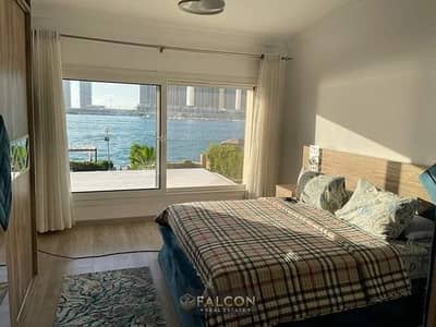 With a view of the Crystal Lagoon, opposite the Alamein Towers, a two-bedroom chalet is for sale at launch price, next to the Heritage City and Alamei