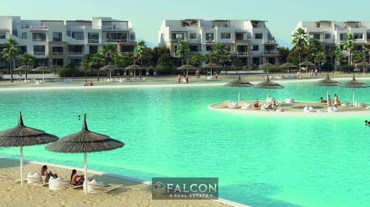 Ground floor chalet with garden for sale (finished with air conditioning and kitchen) by Hassan Allam, with a coastal view on the Red Sea