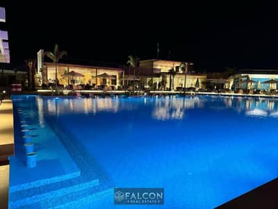 Chalet for sale, first row on the sea, in Sea Shore North Coast, Ras El Hekma Bay, with 8-year installments.