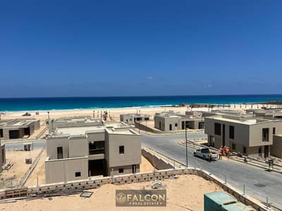 For sale: First Row villa on the sea, fully finished, in June Sodic, North Coast, with installments over 8 years.