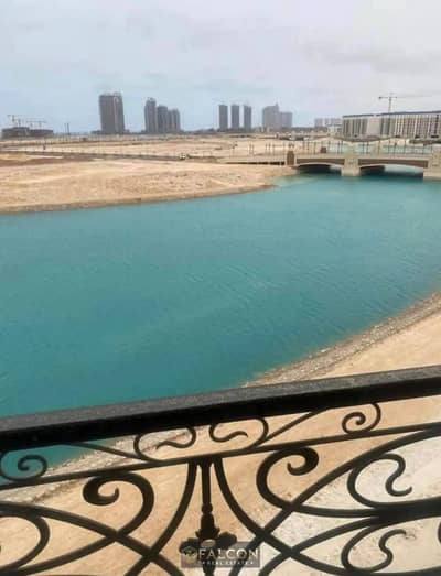 View on lagoon & towers Apartment 158m for sale - immediate delivery - fully finished - in Latin - New Alamein - North Coast Next Marina 7 & Marassi
