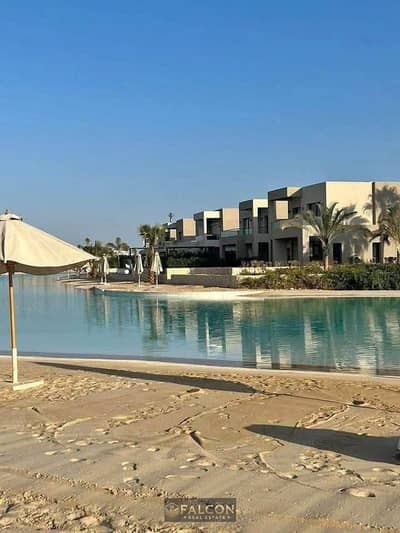 300 متر للبحر + صف أول لاجون شاليه 112م متشطب + ACs  والمطبخ للبيع في ازها الساحل راس الحكمة بجوار فوكا باي وماونتن فيو Azha North Coast Ras El Hekma