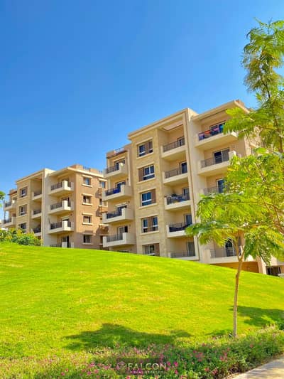 Receive an apartment in Sarai Compound (125m - Sea View - Corner) with a 50% discount, wall-to-wall with Madinaty