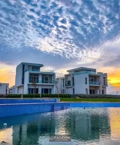 Standalone villa, First Row (350 sq m), Ground floor, First floor, Roof - 40% discount + Double View, minutes from the sea, next to Al Alamein Towers