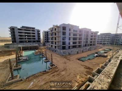 Two-bedroom apartment for sale with a down payment of 870,000 in La Vista Patio Riva Compound in the heart of the Fifth Settlement