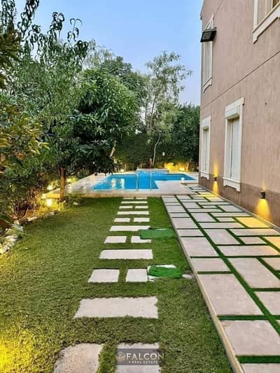 Townhouse villa with ( RTM ) Open lake view for sale installments in a prime location near Patio Oro and Mountain View ICity new cairo